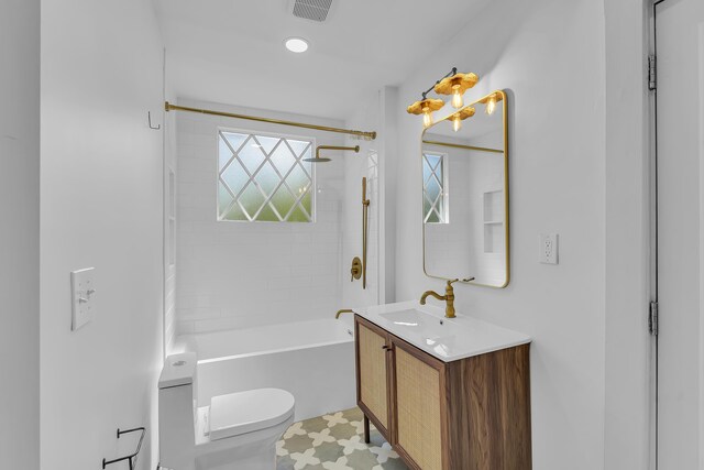 10 Beech, Spartanburg, SC 29303 - bathroom featuring vanity, toilet, and washtub / shower combination