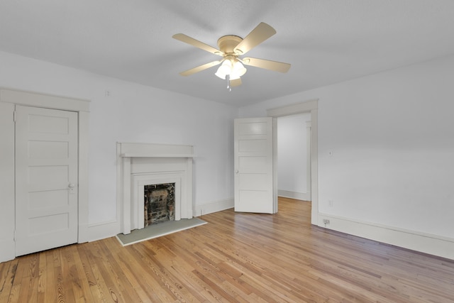 10 Beech, Spartanburg, SC 29303 - unfurnished living room with a fireplace, light wood-type flooring, ceiling fan, and baseboards
