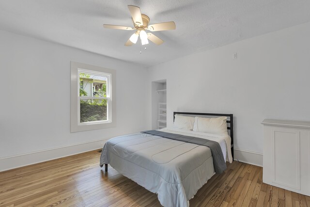 10 Beech, Spartanburg, SC 29303 - bedroom featuring wood finished floors, ceiling fan, and baseboards