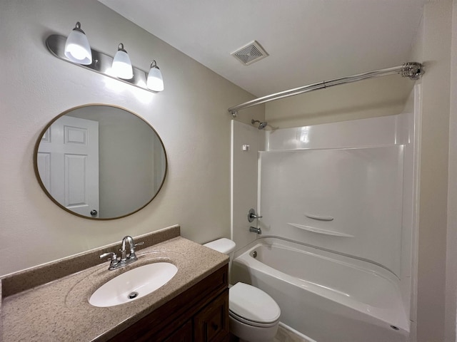 full bath featuring toilet, tub / shower combination, and vanity