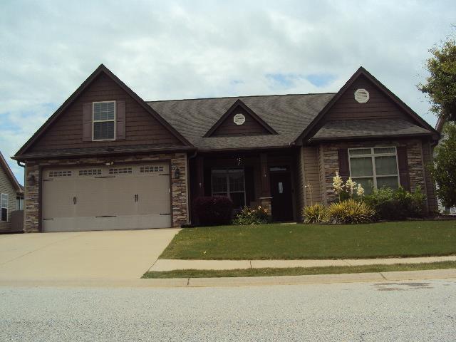 108 Dewfield, Boiling Springs, SC 29316 - craftsman-style house with driveway, stone siding, and a front yard