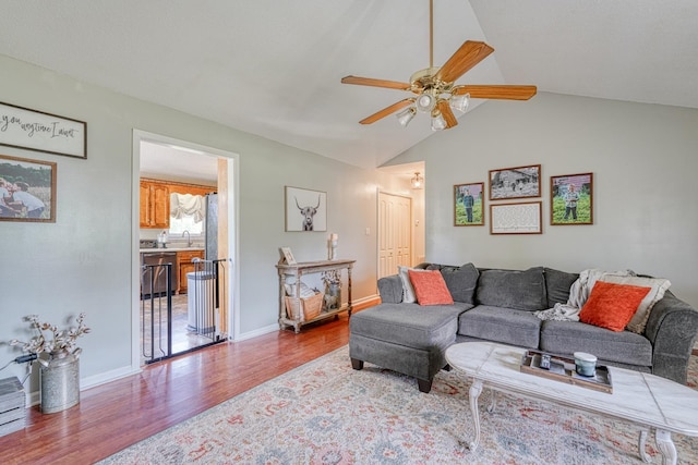 213 Mystic, Chesnee, SC 29323 - living room with wood finished floors, a ceiling fan, lofted ceiling, and baseboards