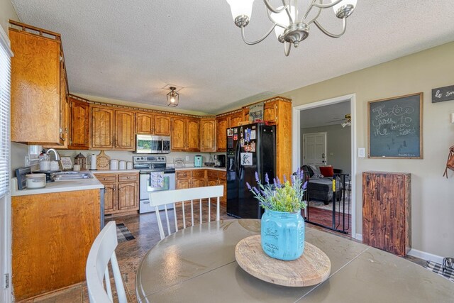 213 Mystic, Chesnee, SC 29323 - dining area featuring a chandelier and a textured ceiling