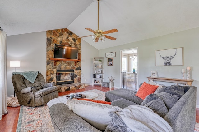 213 Mystic, Chesnee, SC 29323 - living room with wood finished floors, ceiling fan, vaulted ceiling, a stone fireplace, and baseboards