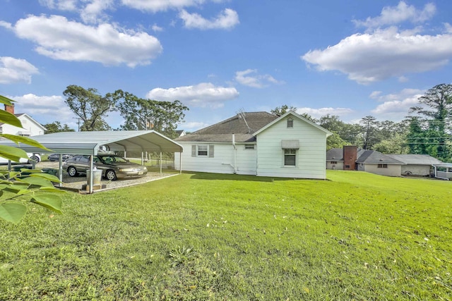 1 Robinsview, Spartanburg, SC 29301 - rear view of house with a yard, a detached carport, and roof with shingles
