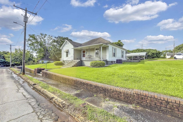 1 Robinsview, Spartanburg, SC 29301 - view of front of house featuring covered porch, a front yard, and central AC unit