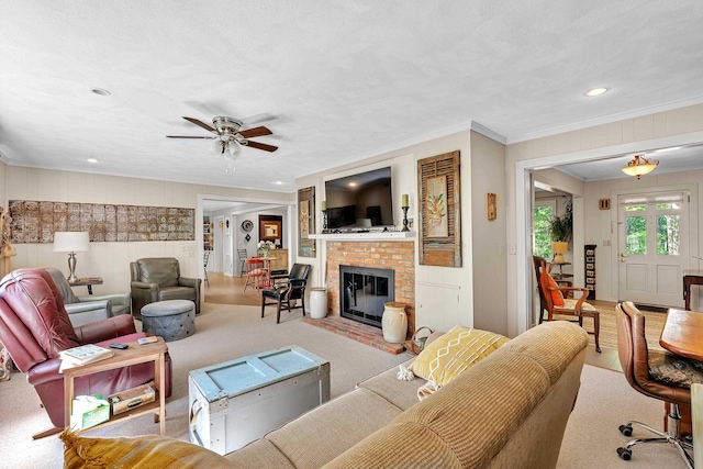 7 Hearthstone, Landrum, SC 29356 - living area with crown molding, ceiling fan, a fireplace, recessed lighting, and carpet