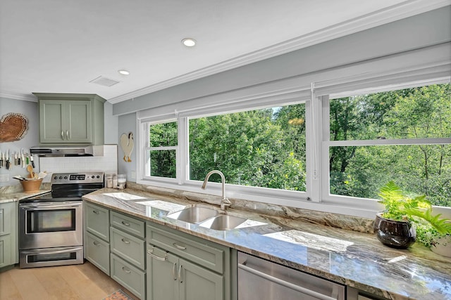 7 Hearthstone, Landrum, SC 29356 - kitchen featuring stainless steel appliances, a sink, crown molding, ventilation hood, and light stone countertops