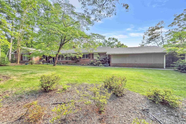 7 Hearthstone, Landrum, SC 29356 - ranch-style home with brick siding and a front lawn