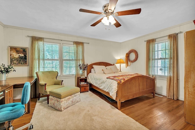 7 Hearthstone, Landrum, SC 29356 - bedroom featuring wood finished floors, crown molding, and ceiling fan