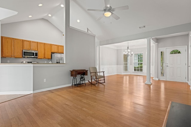 616 W Farrell, Woodruff, SC 29388 - living area with ornate columns, recessed lighting, light wood finished floors, high vaulted ceiling, and a chandelier