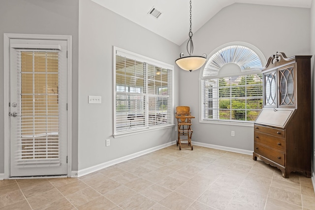 616 W Farrell, Woodruff, SC 29388 - living area featuring vaulted ceiling, baseboards, and light tile patterned flooring