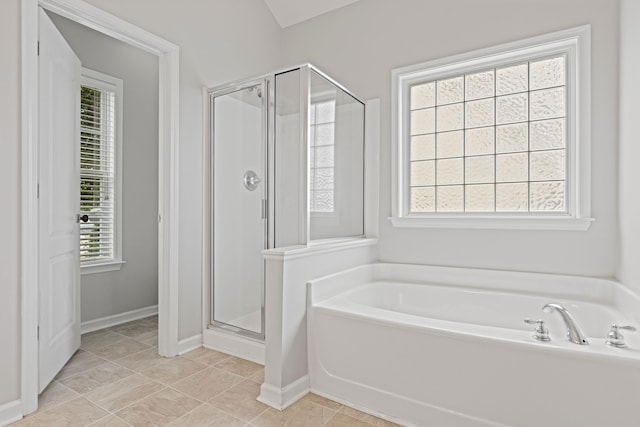 616 W Farrell, Woodruff, SC 29388 - full bathroom with a garden tub, a shower stall, baseboards, and tile patterned flooring