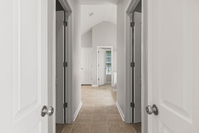 616 W Farrell, Woodruff, SC 29388 - hall with baseboards, lofted ceiling, and light tile patterned floors