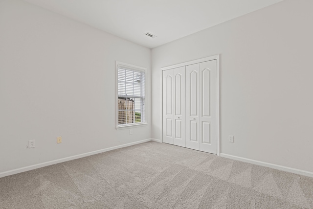 616 W Farrell, Woodruff, SC 29388 - unfurnished bedroom with carpet flooring, baseboards, and a closet