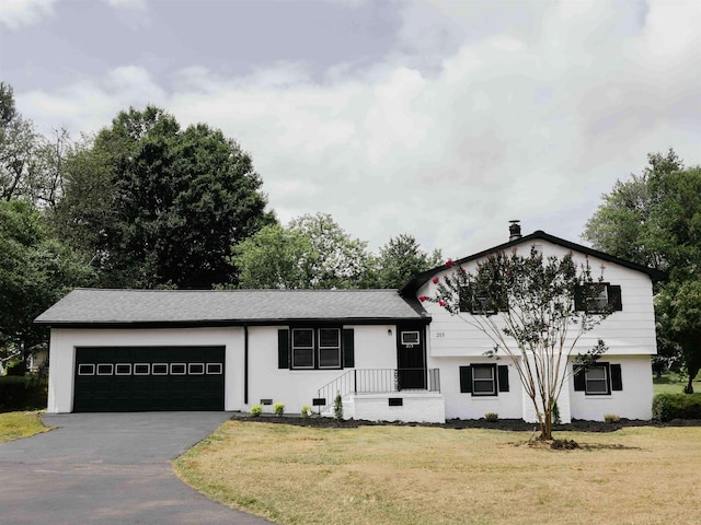 215 Blalock Rd, Boiling Springs, SC 29316 - tri-level home featuring a garage, driveway, a front lawn, and a shingled roof