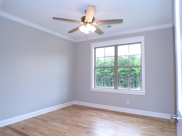 291 Robbins, Chesnee, SC 29323 - spare room featuring light wood-style floors, crown molding, baseboards, and a ceiling fan