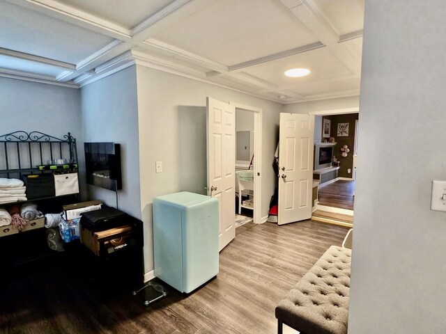 719 Magness Dr, Spartanburg, SC 29303 - living room featuring coffered ceiling, wood finished floors, beam ceiling, and baseboards