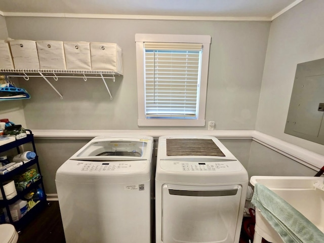 719 Magness Dr, Spartanburg, SC 29303 - washroom with washing machine and dryer, electric panel, and wood finished floors