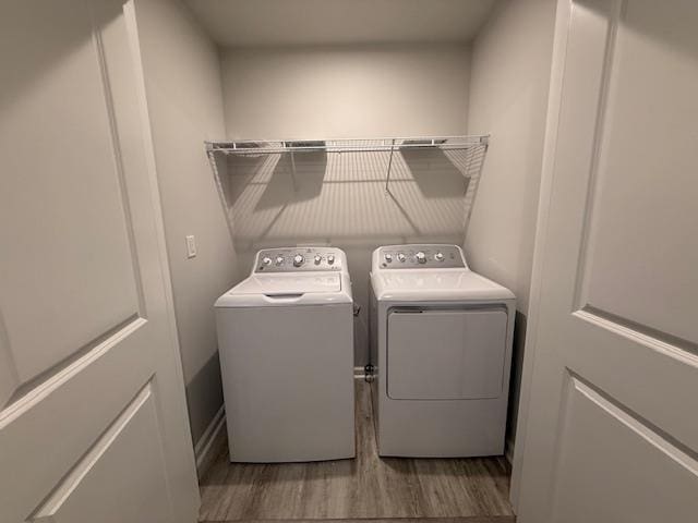 1214 Forestbrook, Spartanburg, SC 29303 - laundry area featuring washing machine and dryer and wood finished floors