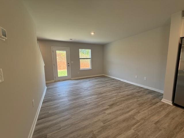 1214 Forestbrook, Spartanburg, SC 29303 - spare room featuring baseboards, dark wood finished floors, and recessed lighting