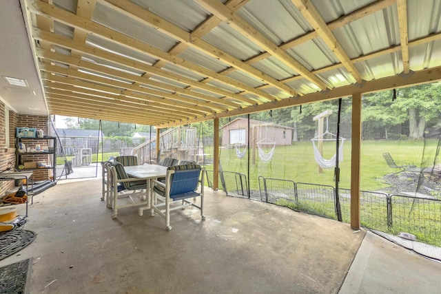 469 Royal Oak, Spartanburg, SC 29302 - sunroom / solarium featuring outdoor dining space
