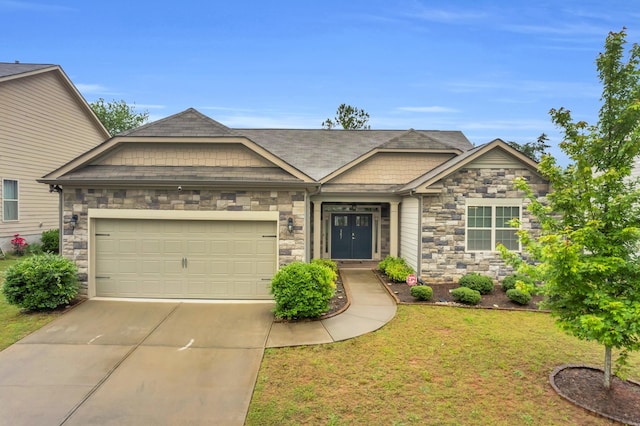 267 Santa Ana, Duncan, SC 29334 - craftsman-style house featuring stone siding, concrete driveway, a garage, and a front yard