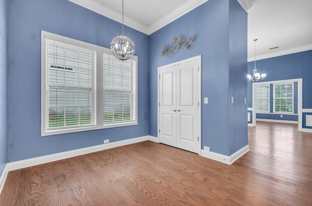 267 Santa Ana, Duncan, SC 29334 - unfurnished dining area featuring a chandelier, wood finished floors, ornamental molding, and baseboards