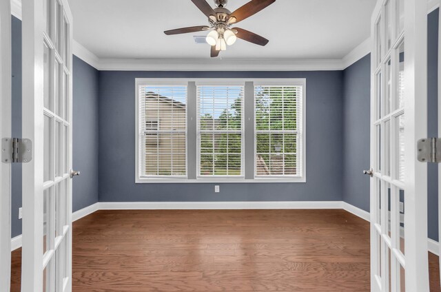 267 Santa Ana, Duncan, SC 29334 - spare room featuring french doors, wood finished floors, baseboards, crown molding, and a ceiling fan