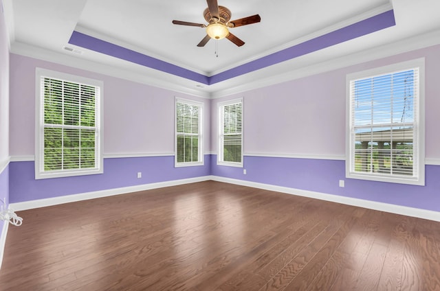267 Santa Ana, Duncan, SC 29334 - empty room with a tray ceiling, dark wood finished floors, ornamental molding, a ceiling fan, and baseboards
