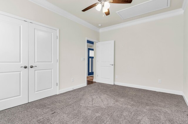 267 Santa Ana, Duncan, SC 29334 - unfurnished bedroom with attic access, carpet flooring, crown molding, a closet, and ceiling fan