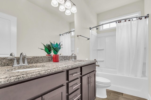 267 Santa Ana, Duncan, SC 29334 - bathroom with shower / bathtub combination with curtain, toilet, double vanity, and wood finished floors