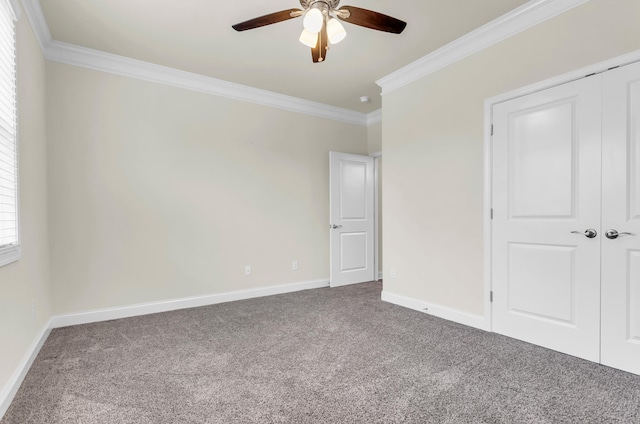 267 Santa Ana, Duncan, SC 29334 - unfurnished bedroom featuring crown molding, carpet floors, baseboards, a closet, and ceiling fan