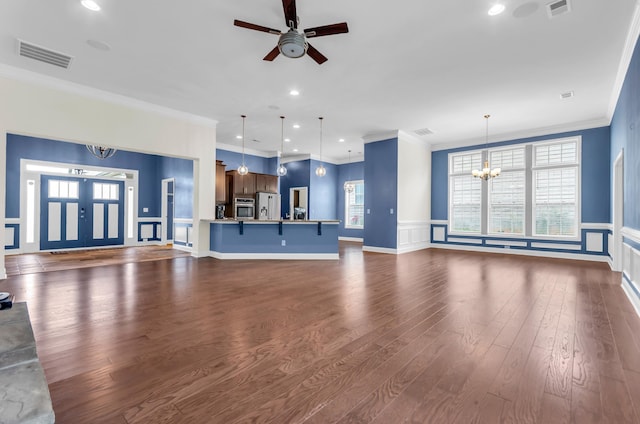 267 Santa Ana, Duncan, SC 29334 - unfurnished living room featuring a chandelier, ceiling fan, dark wood finished floors, crown molding, and recessed lighting