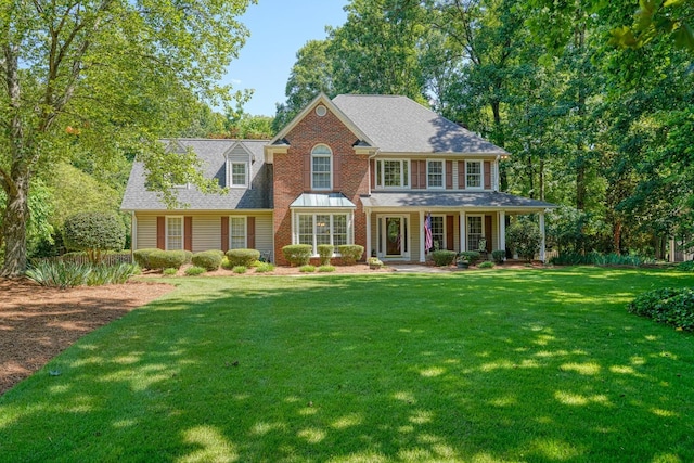 201 Woodridge, Spartanburg, SC 29301 - view of front of home featuring a front lawn and covered porch