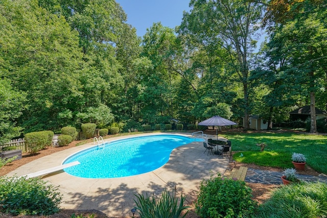 201 Woodridge, Spartanburg, SC 29301 - swimming pool featuring a diving board, a patio, and an outbuilding