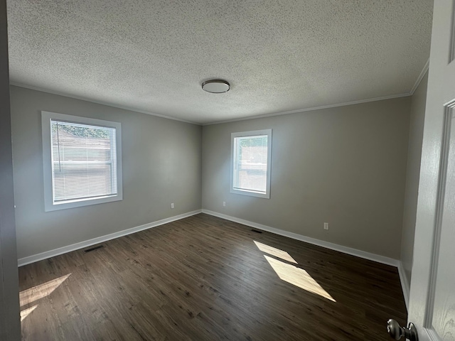 121 Pacolet, Gaffney, SC 29340 - empty room with dark wood finished floors, a textured ceiling, baseboards, and crown molding