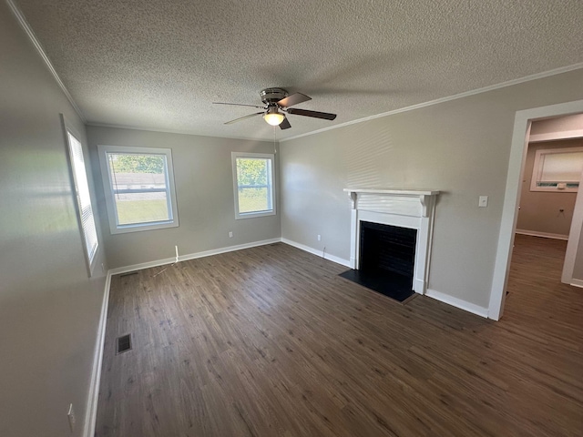 121 Pacolet, Gaffney, SC 29340 - unfurnished living room with a textured ceiling, a fireplace with flush hearth, dark wood finished floors, ceiling fan, and crown molding