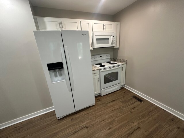 121 Pacolet, Gaffney, SC 29340 - kitchen with white appliances, dark wood-style floors, and white cabinetry