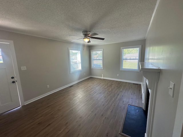 121 Pacolet, Gaffney, SC 29340 - unfurnished living room featuring crown molding, dark wood-style flooring, a textured ceiling, a ceiling fan, and baseboards