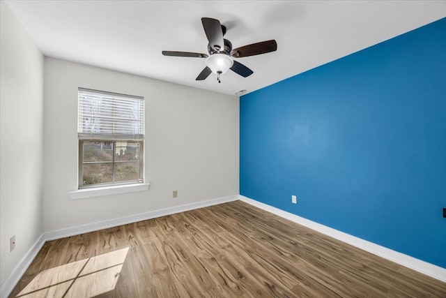 624 Renita, Boiling Springs, SC 29316 - empty room with baseboards, wood finished floors, and ceiling fan