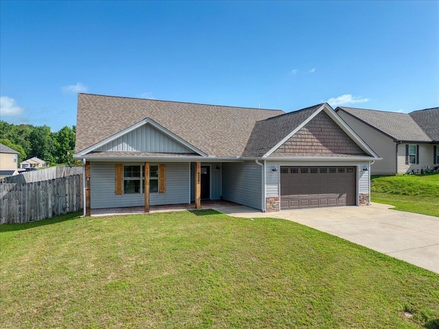 624 Renita, Boiling Springs, SC 29316 - view of front of house with a garage, concrete driveway, covered porch, and roof with shingles