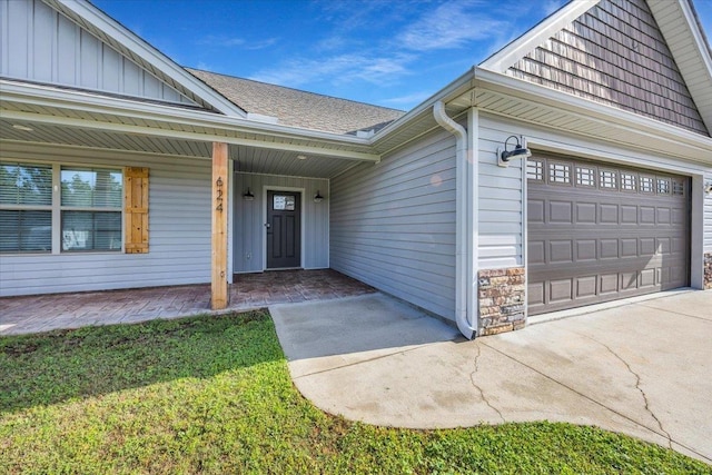624 Renita, Boiling Springs, SC 29316 - entrance to property with board and batten siding, stone siding, a garage, and driveway