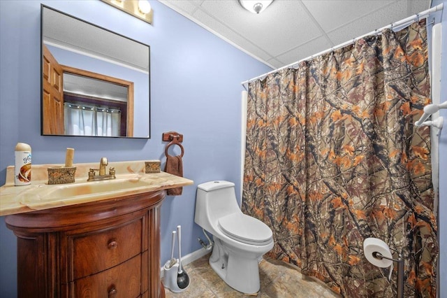 775 Buck Crk, Chesnee, SC 29323 - full bathroom featuring toilet, vanity, a drop ceiling, baseboards, and a shower with shower curtain