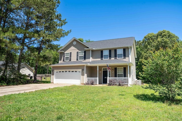 770 Grace Vly, Inman, SC 29349 - view of front facade featuring covered porch, a garage, concrete driveway, and a front yard
