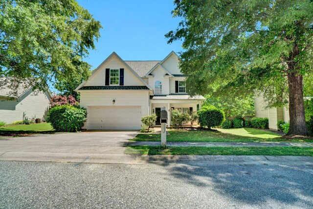 905 Morning Mist, Simpsonville, SC 29680 - traditional home with driveway, an attached garage, and a front lawn