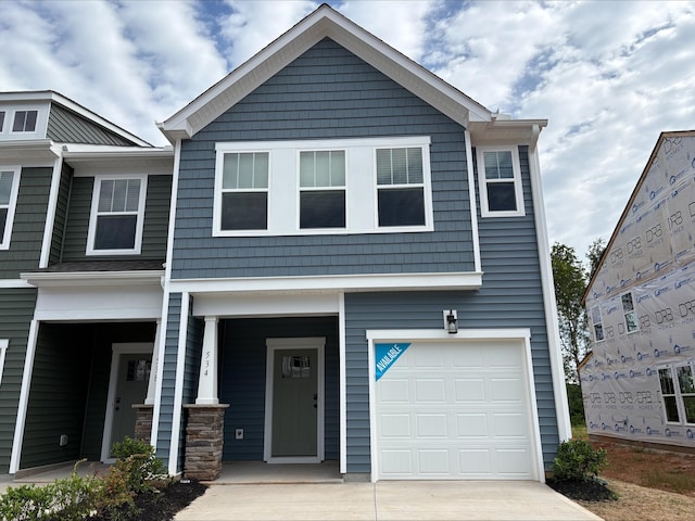 534 W Norvell Ct, Spartanburg, SC 29307 - view of front of house with a garage, driveway, and a porch