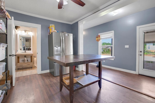 1050 W Blackstock, Spartanburg, SC 29301 - dining room with wood finished floors, plenty of natural light, ornamental molding, and a ceiling fan