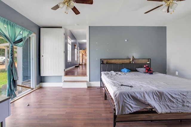 1050 W Blackstock, Spartanburg, SC 29301 - bedroom with access to exterior, wood finished floors, a ceiling fan, and baseboards