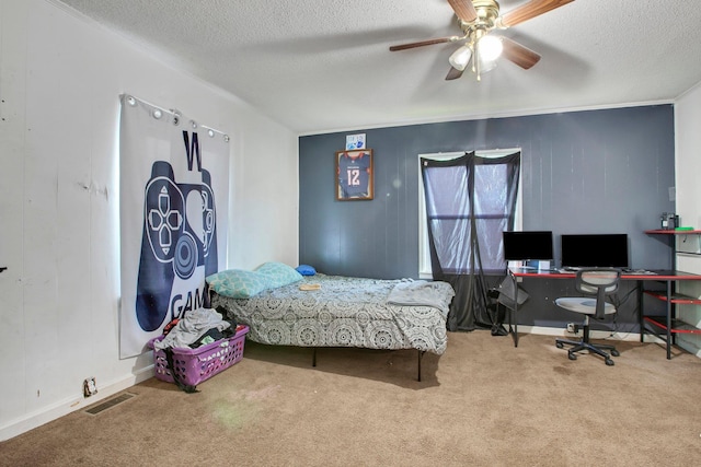 1050 W Blackstock, Spartanburg, SC 29301 - bedroom featuring carpet, a textured ceiling, an office area, ceiling fan, and baseboards